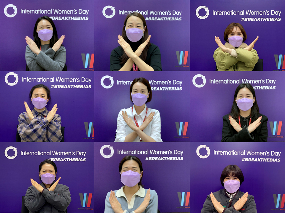 농심켈로그 여성 직원들이 세계 여성의 날을 상징하는 보라색 마스크를 착용하고 올해 캠페인 테마를 보여주는 포즈를 취하고 있다. 사진=농심켈로그